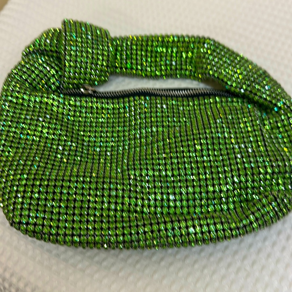 A gorgeous green sequined shoulder bag on black .SALE ONE DAY ONLY